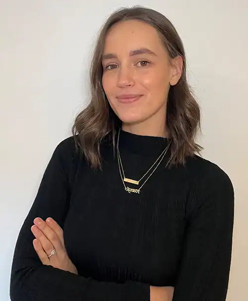 Photo of James Collier in tee on dark background