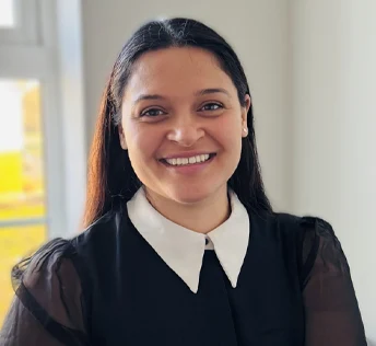 Photo of James Collier in tee on dark background